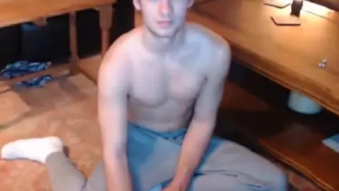 Blue-eyed hottie shows off on cam