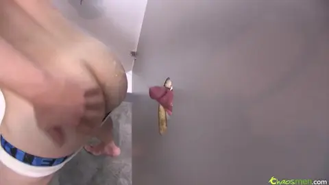 Blowjob in public restroom gloryholes