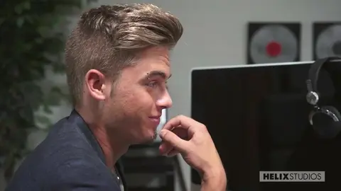 The photographer watches his models having sex.