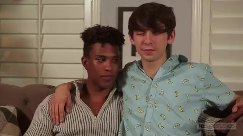 Twink sits on a black hunk’s dick