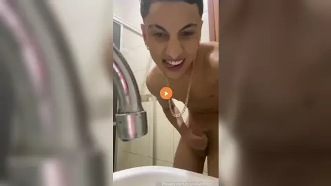 Gabriel Ritelli shows off his hard cock in the bathroom